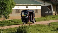 Driewiel taxi.