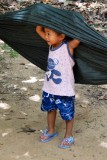 Little kid playing hide and seek