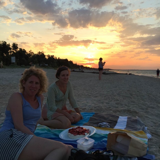Beach pavlova with strawberry and sunset