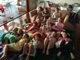 A bunch of girls watching the Annie movie