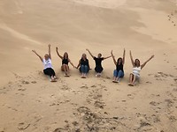 Groepsfoto sandboarden
