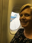 In het vliegtuig, op weg naar Beijing