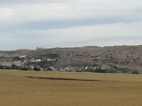 Zicht op Cerezo de Riotiron met oude ruines