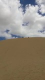Marc aan het sandboarden