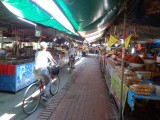 Biking through a market