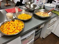 preparing butternut squash soup at church for people in need