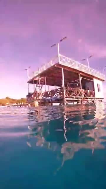 Groepsjump van de Jetty (het duik-huis)