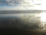 als je goed kijkt zie je me ergens surfen