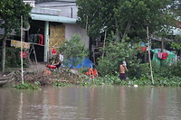 Wassen, afwassen en jezelf wassen in de Mekong.