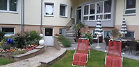 Onze tuin bij hotel
