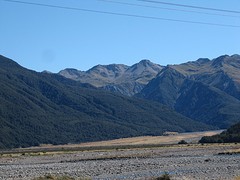 IMG_3739_TranzAlpine van Greymouth naar Christchurch - vergezicht vlakte met bergen
