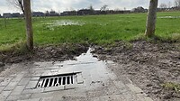 Wel met afvoer