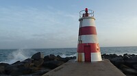 Op het puntje van de pier bij het strand van Portimao