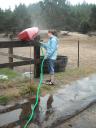 Hosing down the kayaks