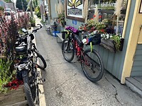 Our bike's in front of the shop / cafe