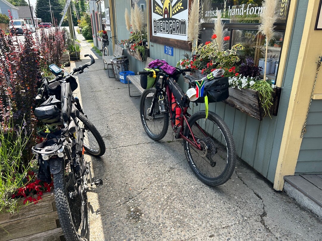Our bike's in front of the shop / cafe