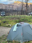 My tent with the beautiful view of the mountains, apart from the burned area