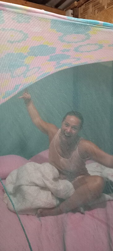 In our bungalow in mosquito net