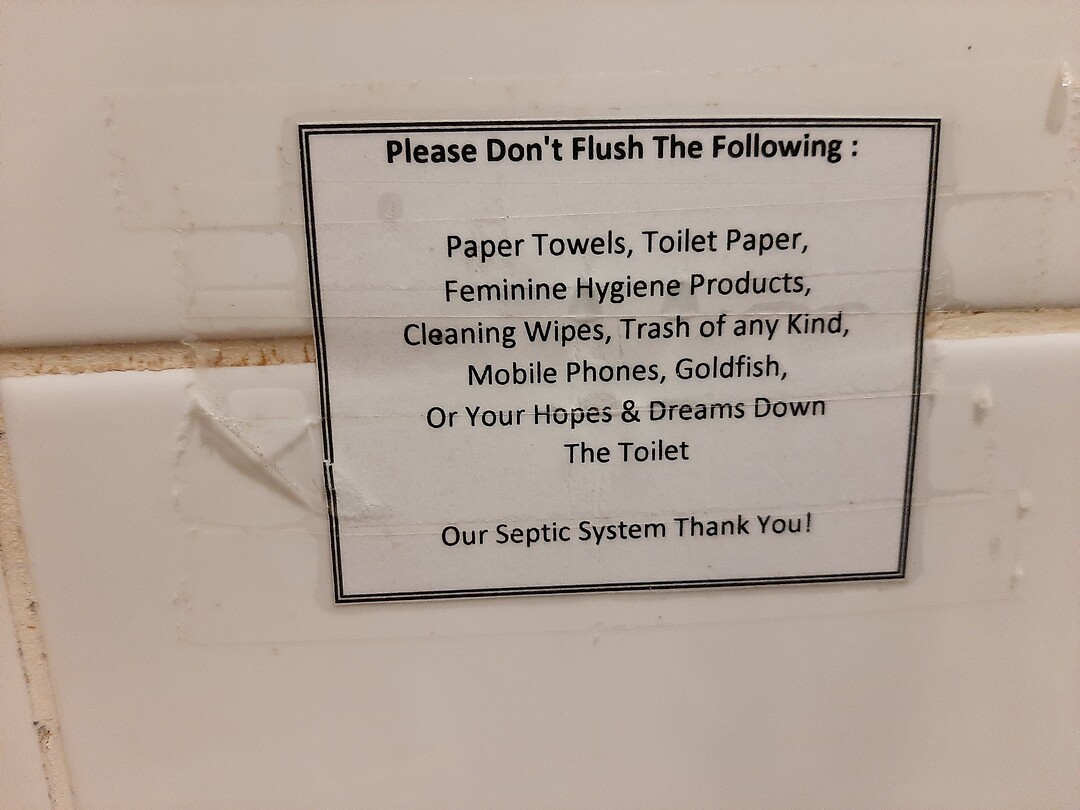 Text in toilet by hostel