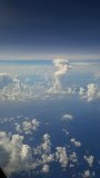 In de wolken