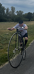 Boer op fiets