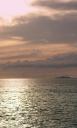 zonsopgang Mabul, in de verte het eiland Sipadan