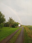 Regenboog in de vroege morgen