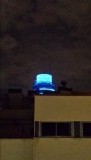 Foto genomen vanuit appartement,Lichtkoepel verandert voortdurend van kleur