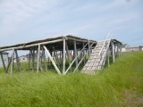 Houten stellages waar vooral de Engelse vissers de kabeljouw op droogden.