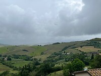 Toscaanse heuvels met onweer