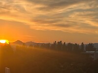 Zonsondergang vanaf onze hotelkamer