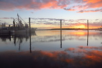 Zonsondergang op een pier