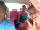 In the pink barbie taxi