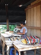 Señorita making corn tortillas, Guatemalan specialty