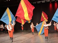 België