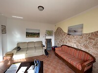 Woonkamer appartement I Due Padroni