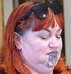 Maori tatoeage op de kin