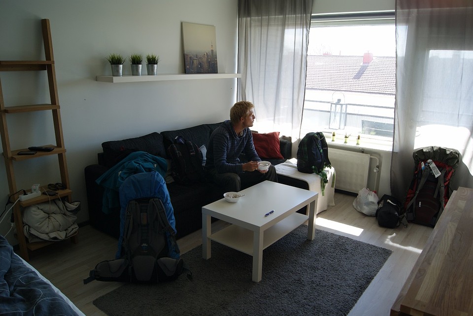 In our apartment, ready to board that last plane