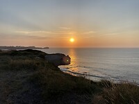 Zonsondergang bij ons huisje