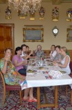 Cheers Lady Phillimore sits at the head of the table with her staff and friends her special lunch