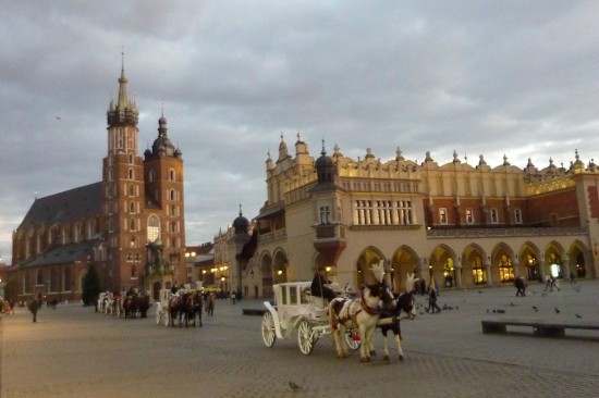 Horsecart passing in front of market square