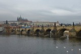 Charles bridge with Prague castle and Saint Vitus Cathedral behind