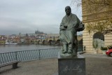 Statue of Bedřich Smetana in front of Moldau and Charles Bridge