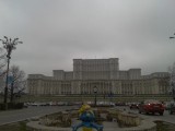 Smurf posing in front of Palace of Parliament