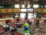 Smurf overseeing trade inside Kuwait Stock Exchange