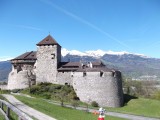 Smurf walking past Vaduz Castle (.LI)