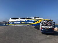 Taking a van to take a boat to Paros