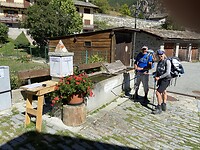 On the way down from the Col. Cooling down at the communal fountain trough