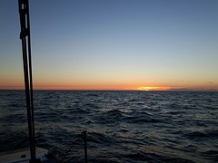 Zonsondergang op zee