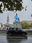 308. Lady in Blue Trafalgar Square